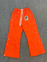 SAINT VANITY sporty casual straight-leg button-down pants